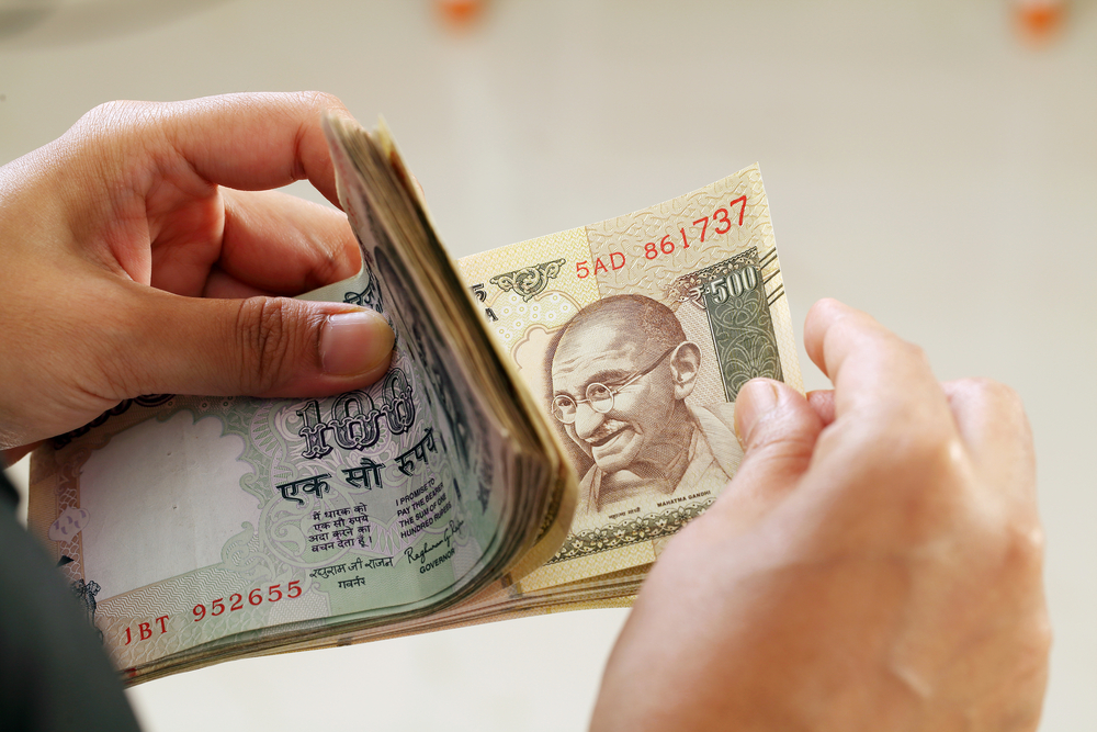 In India, Cash Is Putting Up A Fight