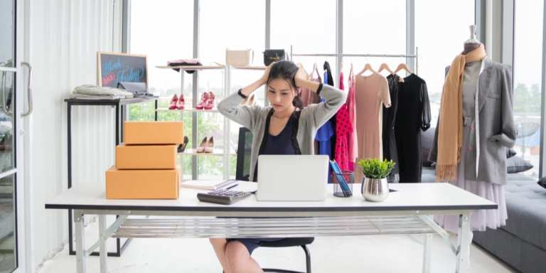 small fashion retailer at desk