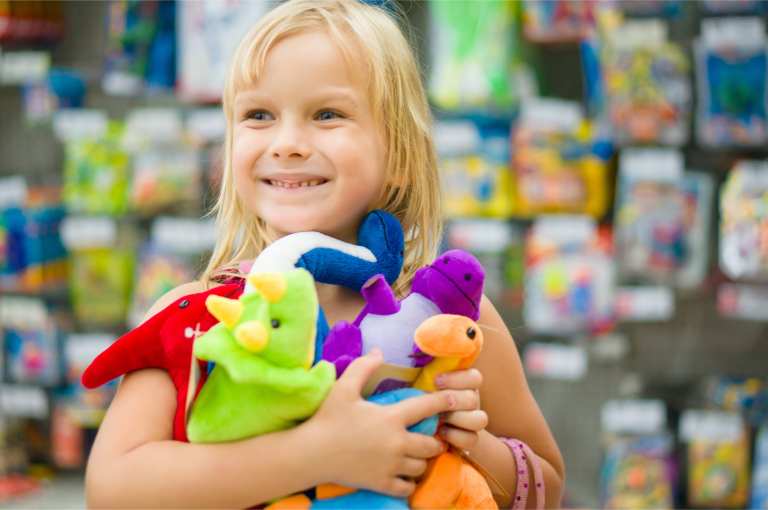 little girl with toys