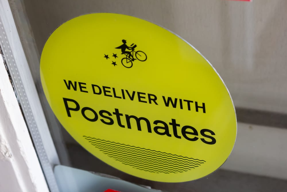 Uber Eyes Postmates Buy