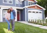 young couple with house