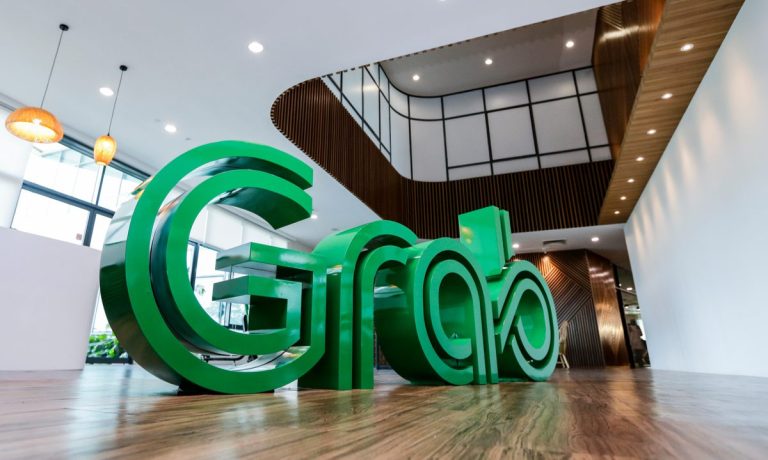 Grab Shares Slide in Nasdaq Debut