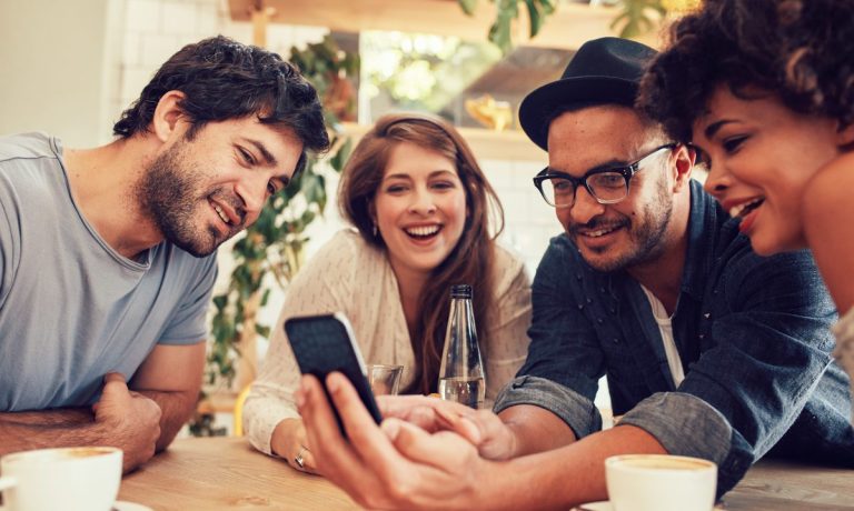 people looking at smartphone