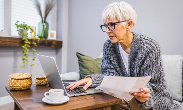 woman paying bills online