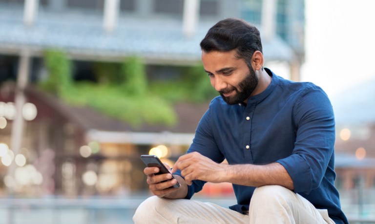 man using mobile wallet