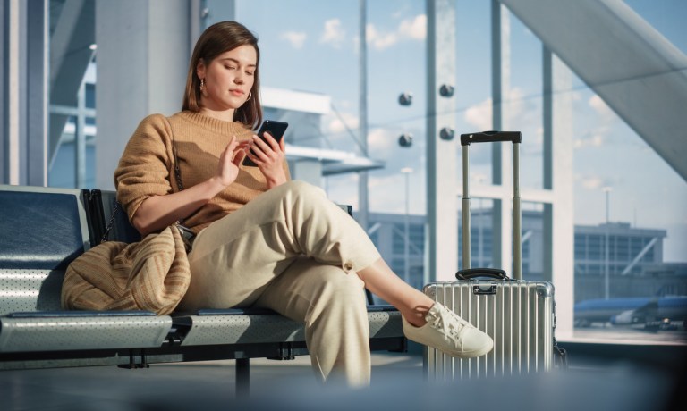 woman using travel app