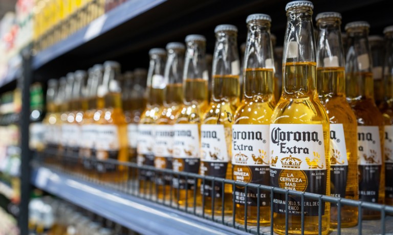 Corona beer bottles on store shelf