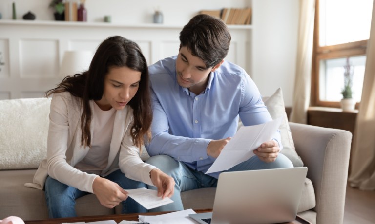 couple looking at finances