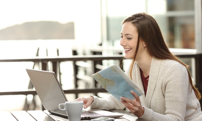 woman booking travel online