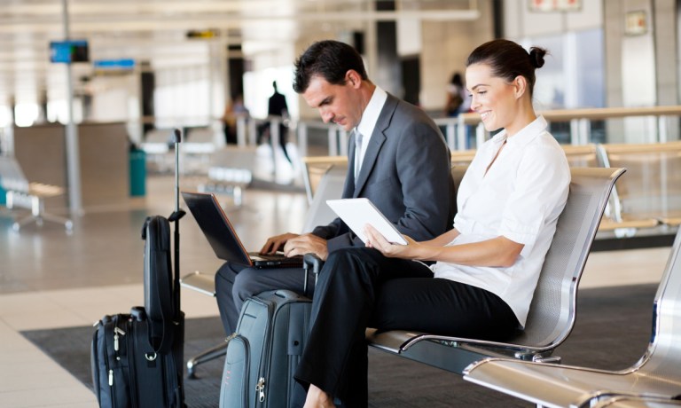 two business travelers at airport