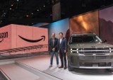 Amazon Drives Online Car Sales; Walmart Revs up Package Delivery