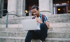 college student with laptop