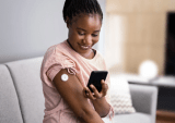 woman checking health with phone