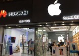 Apple and Huawei stores in China