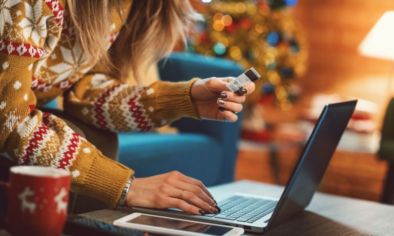 woman holiday shopping online