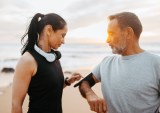 couple running with fitness app