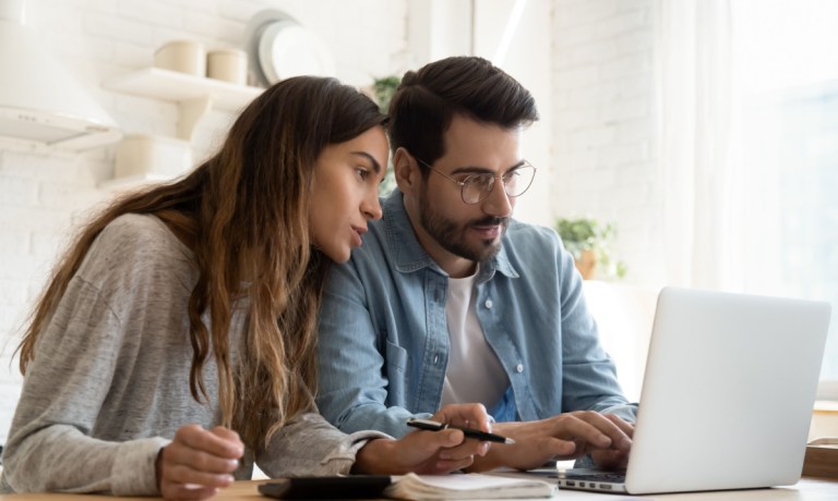 couple looking at finances