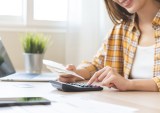 woman balancing budget