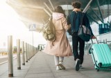 traveling couple at airport