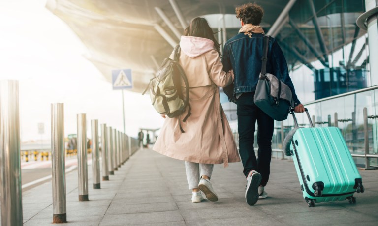 traveling couple at airport