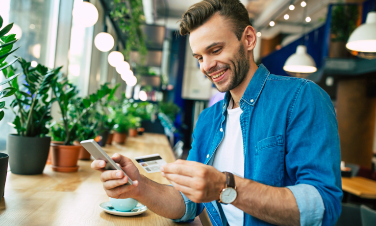 man using credit card