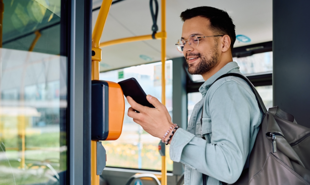 man using mobile wallet for transportation fare