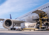 cargo being loaded onto airplane