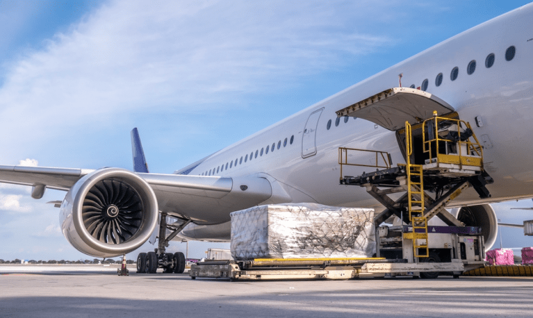 cargo being loaded onto airplane