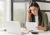 woman at computer worried