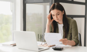 woman at computer worried