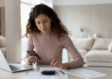 woman working on household budget