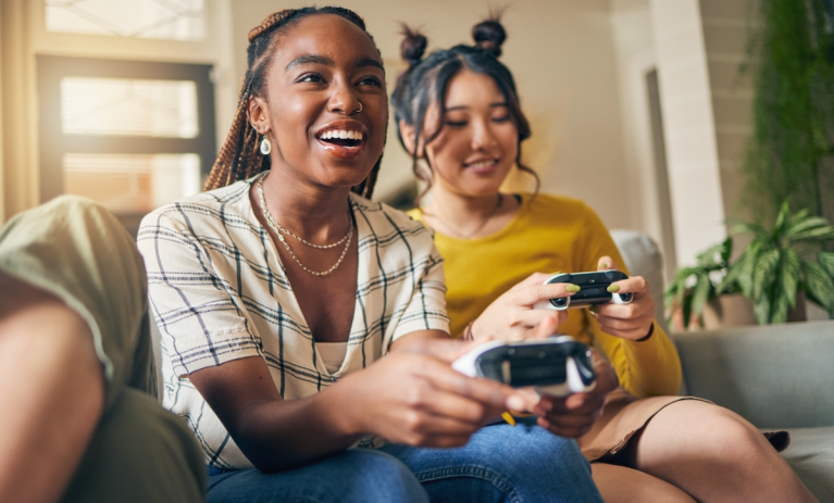 two young people playing video game