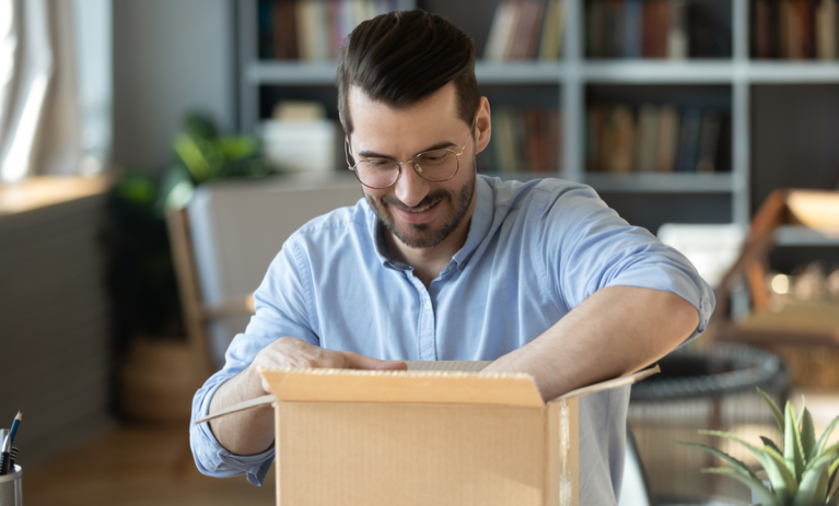 man opening eCommerce box