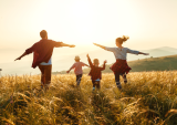 parents with kids in field