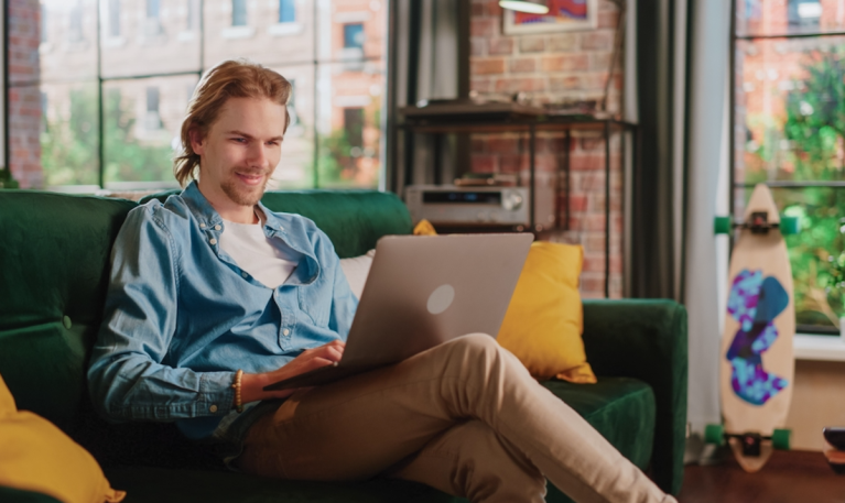 young man with laptop