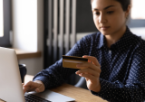 woman paying online with card