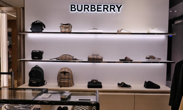 Luxury Brands Slash Prices to Entice Middle-Income Buyers