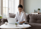 woman looking at finances