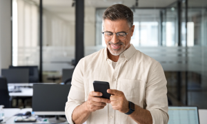 man banking with phone