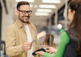 man paying at mobile POS