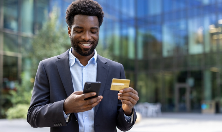businessman with credit card and phone
