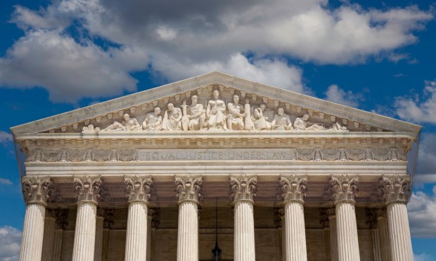 Supreme Court Weighs Limits of Presidential Tariff Power
